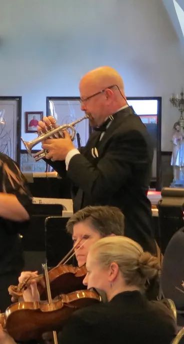 man playing a trumpet