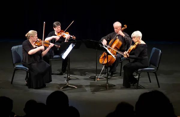 string quartet playing on stage