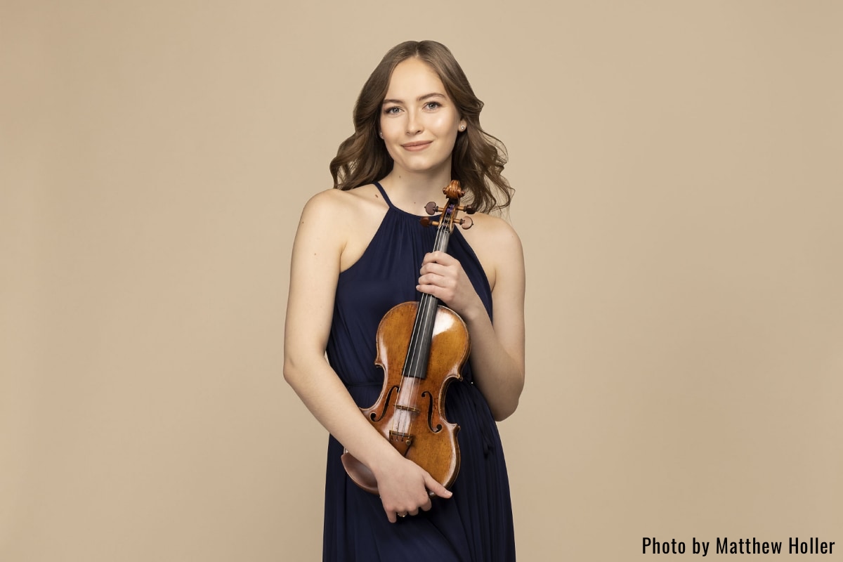 violinist Geneva Lewis; young woman holding her violin; photo courtesy Matthew Holler